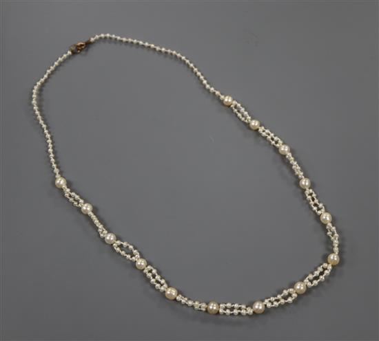 A single and part double strand cultured and seed pearl necklace, 47cm.